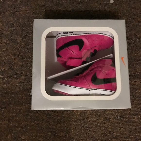 pink and black infant jordans